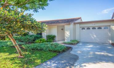 Welcome to 3185-B Via Buena Vista - a two-bedroom, two-bathroom single-level LAS FLORES floorplan in the Laguna Woods senior community. Note the attached one-car garage (with direct access to the residence) and driveway parking for one additional vehicle.