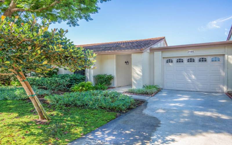 Welcome to 3185-B Via Buena Vista - a two-bedroom, two-bathroom single-level LAS FLORES floorplan in the Laguna Woods senior community. Note the attached one-car garage (with direct access to the residence) and driveway parking for one additional vehicle.