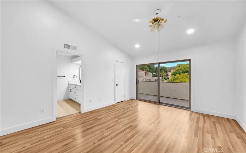 Primary Bedroom has a large balcony.