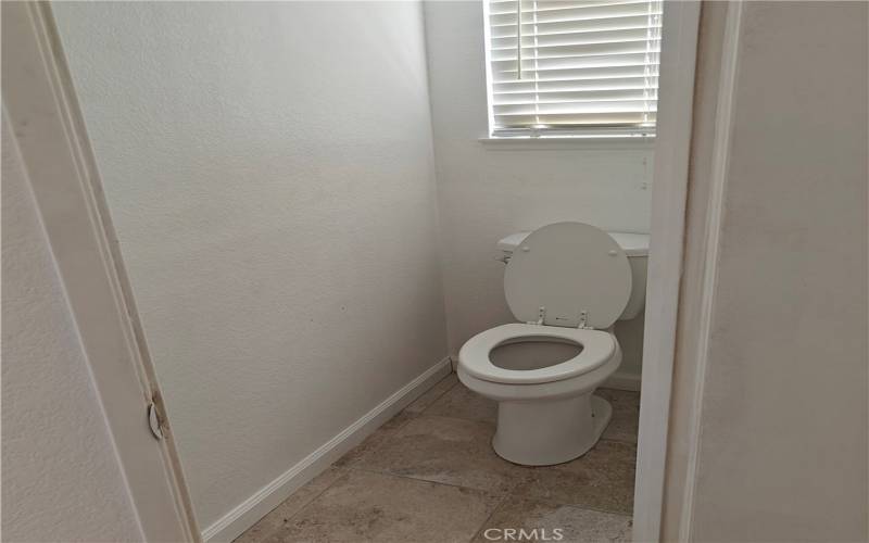 Toilet area with window