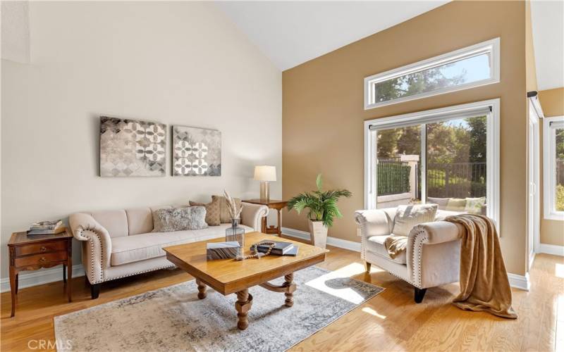 Neutral paint palette, real hardwood floors, and newer double-paned windows throughout the residence.