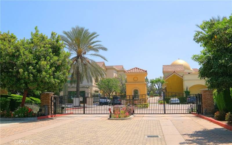 Gated Community with Security Guard at Night