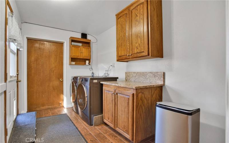 Laundry/Utility room and entrance from Garage to kitchen.