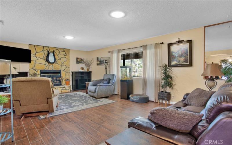 Additional view of living room, tile flooring.