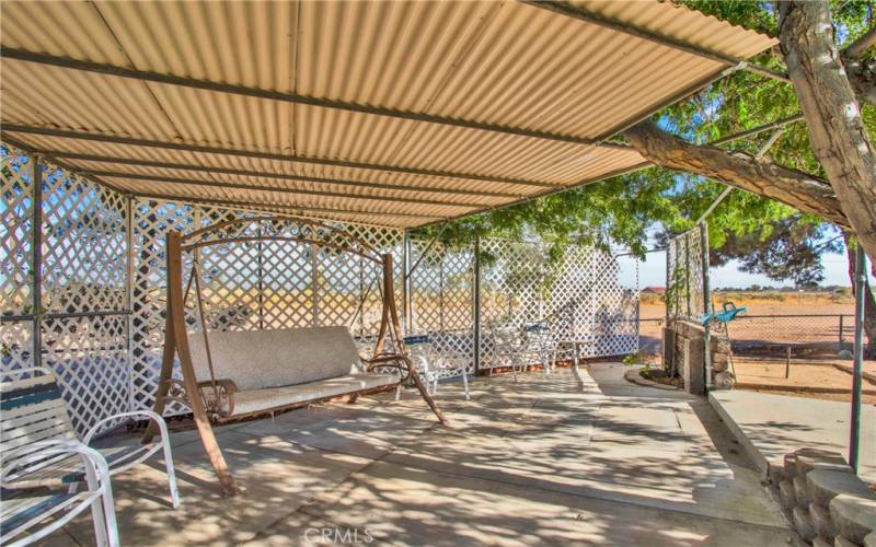 Additional covered patio area.