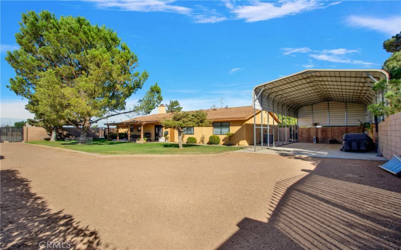 Huge covered, cemented RV pad.