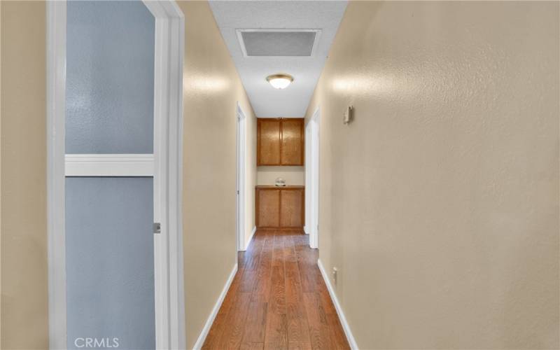 Tiled hallway to bedrooms.