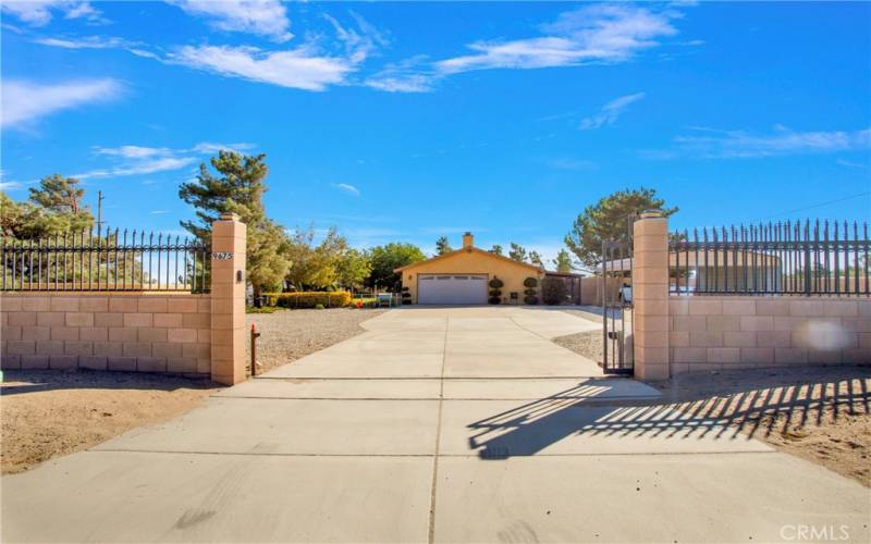 Gated, cemented, block walls all around, automatic Gate.