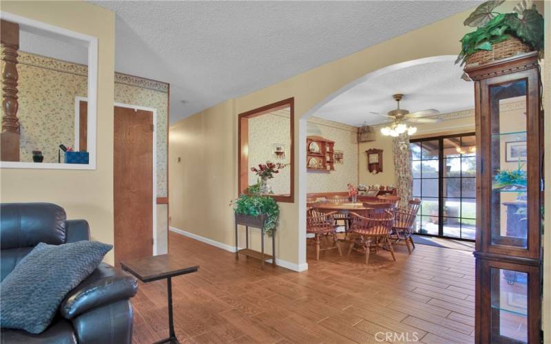 Looking into dinning room and patio sliding door.