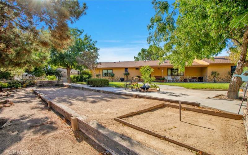 Front side yard area, Horshoe pit, Landscaping, patios.