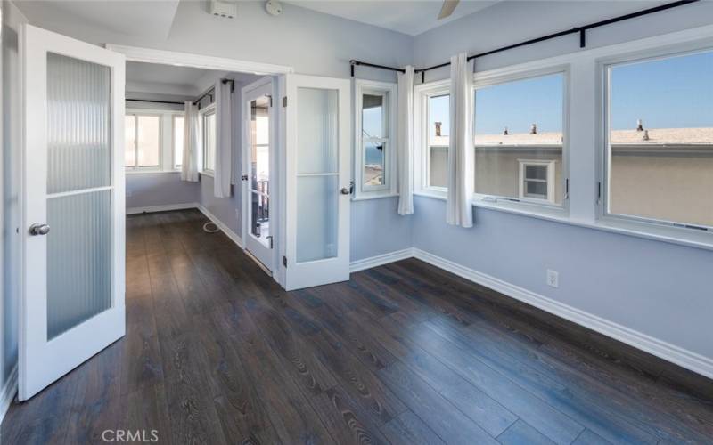 Bedroom with french doors to living room