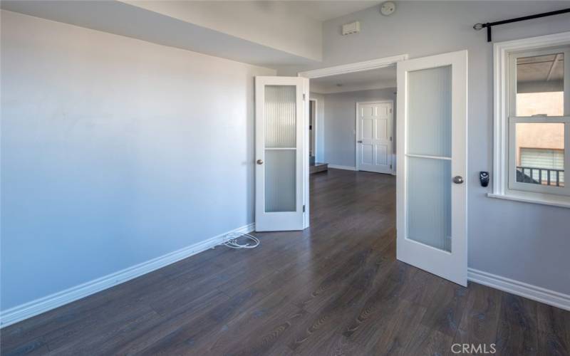 Bedroom with french doors to living room