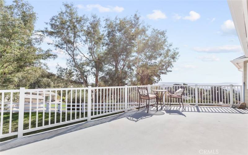 Upstairs deck with access from guest bedroom 1 + primary suite