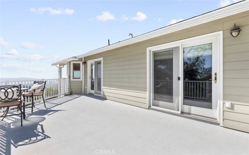 Upstairs deck with access from guest bedroom 1 + primary suite