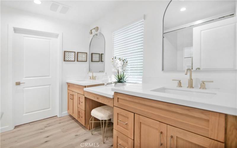 Primary Suite with dual sinks and vanities