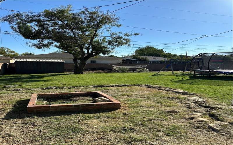 Huge backyard with fire pit,  block wall fencing all around and lots of grass which is all watered by sprinkler system. Its such a delight you've got to come see this gem in Ontario