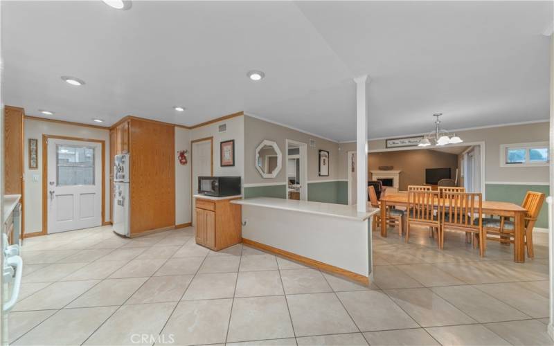 Kitchen opening into dining room