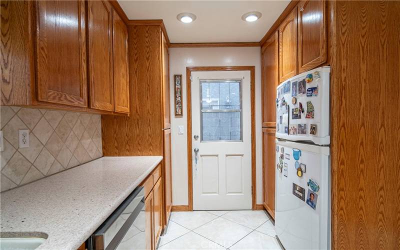 Kitchen with side access to backyard