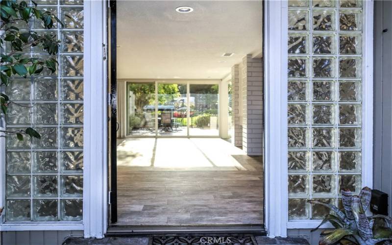 Light and bright entry way with glass detail, welcome home.