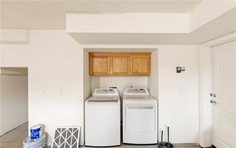 Laundry in garage.