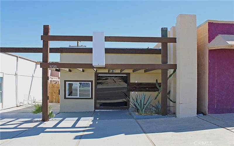 Store/office front facing Adobe rd.