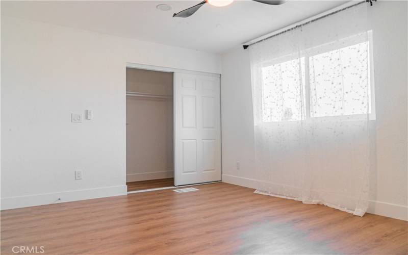 Master bedroom with two closets