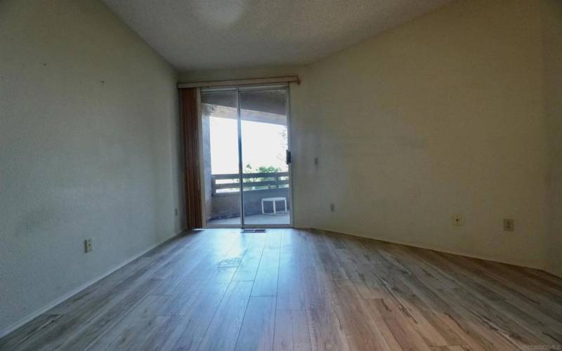 Primary bedroom with access to outdoor deck