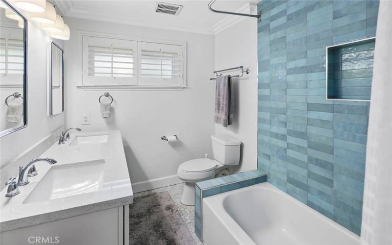 Upstairs bathroom with shower/tub enclosure