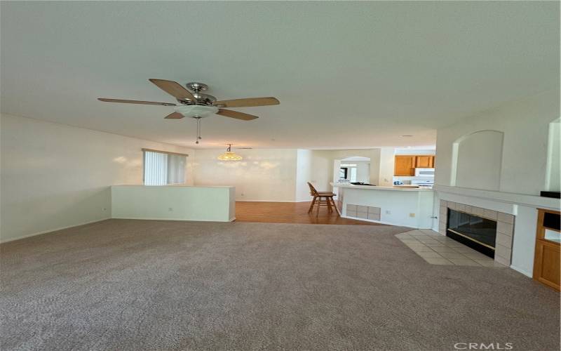 View from family room into dining area and kitchen.