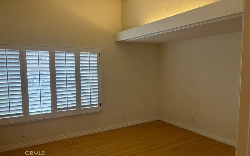 Bedroom 2 with High Ceilings and Mirrored Wardrobe Closet