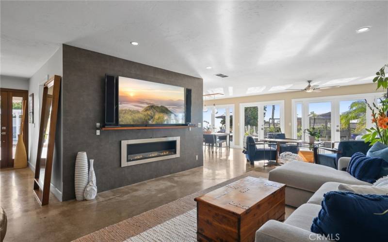 Front door, family room and sitting area