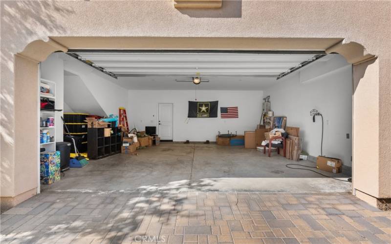 Two car garage with ample storage space