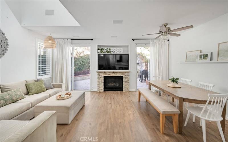 Cozy fireplace in family room and dining room