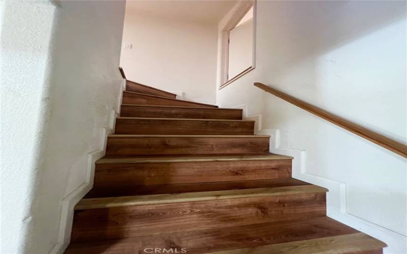 Stair case to loft bonus area.