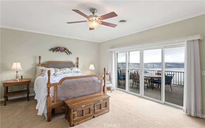 Primary suite with deck access and beautiful views