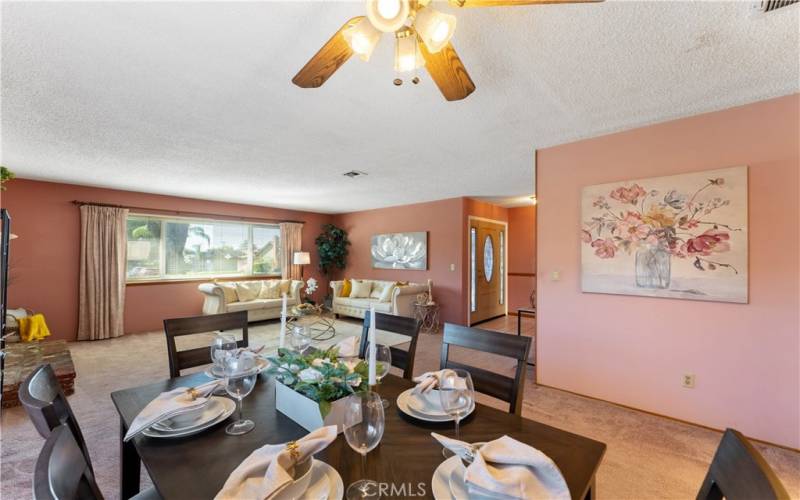 Perspective from dining towards the living room. Wall to the right is spacious enough for a buffet or maybe a piano if you play or however else you desire to use the area.