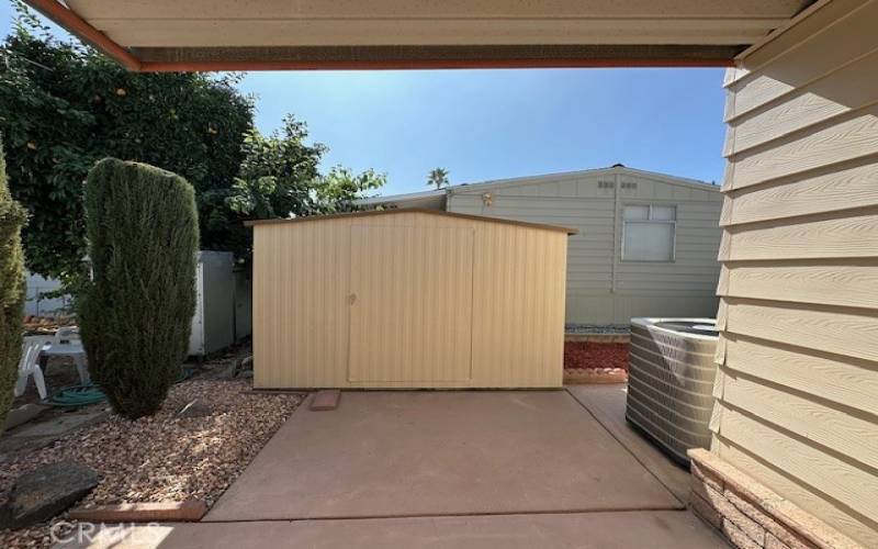 Back of Covered patio showing Shed.