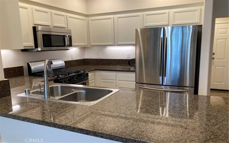 Close up of 

kitchen with Lighting upgraded appliances