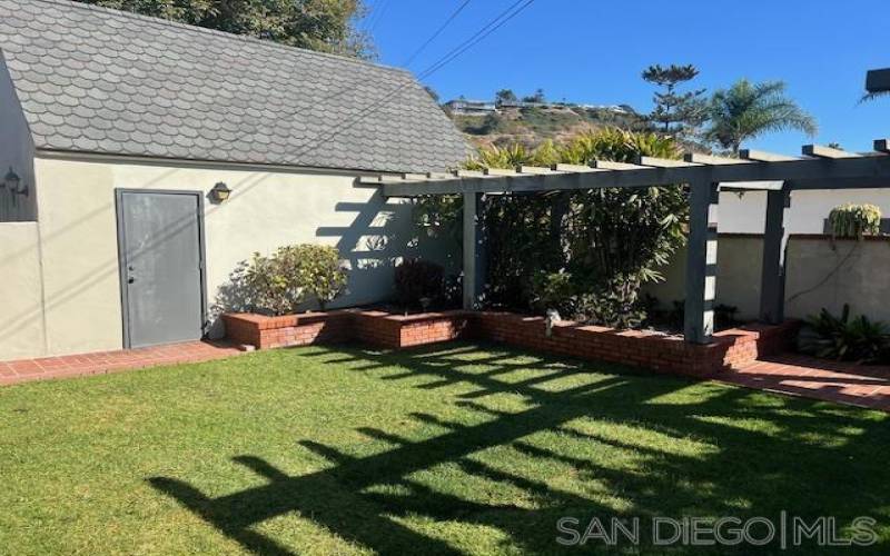 Backyard with access to garage