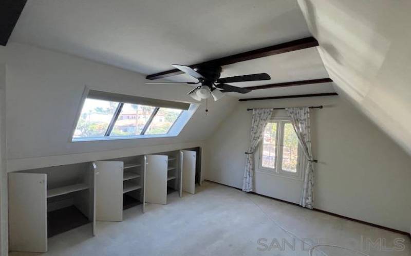 Upstairs bedroom with lots of storage