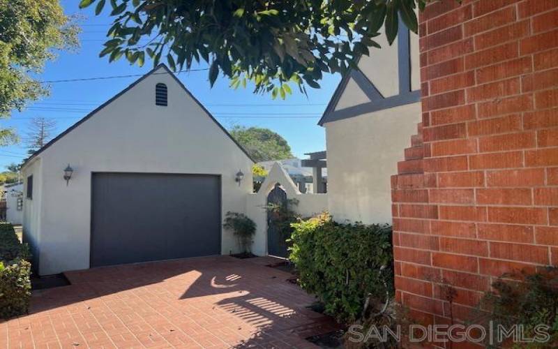 One car garage with overhead storage. Can have one car park in driveway.