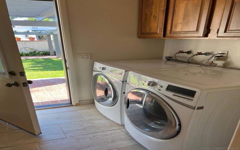 Laundry room with full size washer and dryer