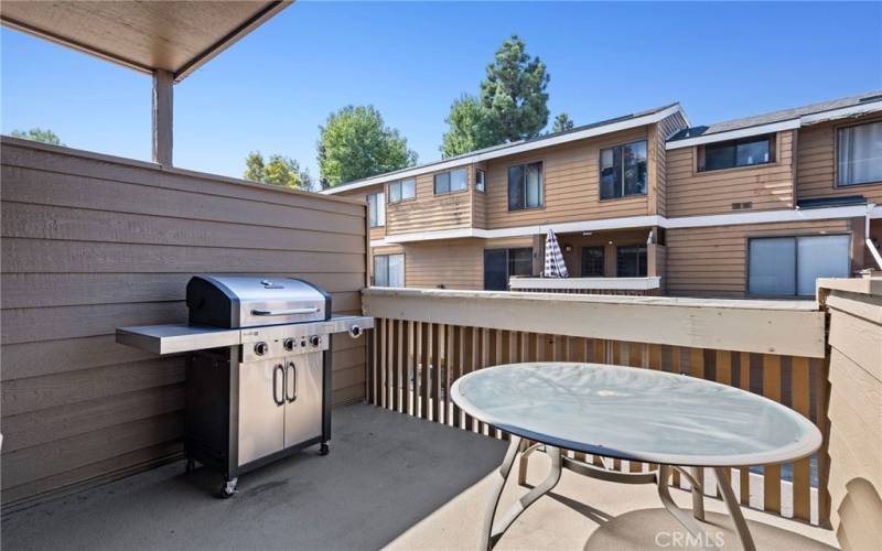 Outside patio/deck adjacent to the kitchen