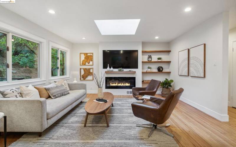 Smart electric fireplace and large skylight added warmth and character.