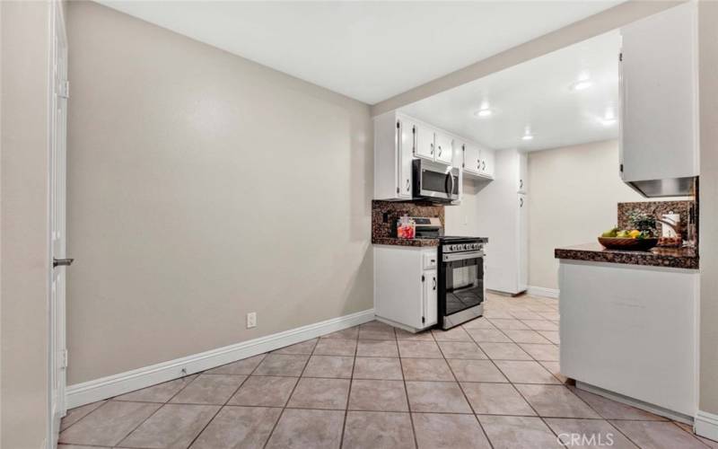 Spacious dining area with closet that can also be used as pantry