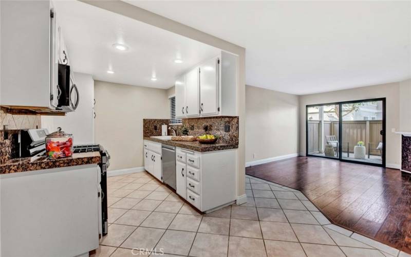 Galley kitchen with stainless steal appliances