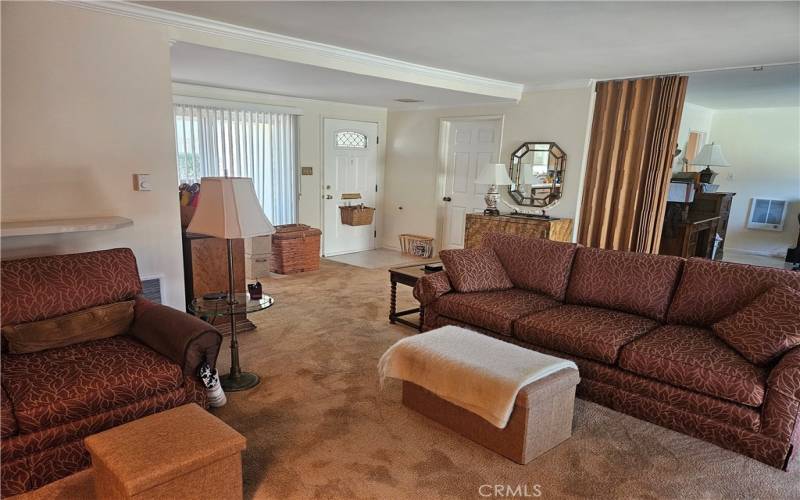 Living room, dining area, front entry. Remember dining room table is gone.