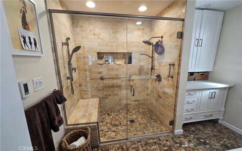 Custom shower, handicap access.  Room for 2.