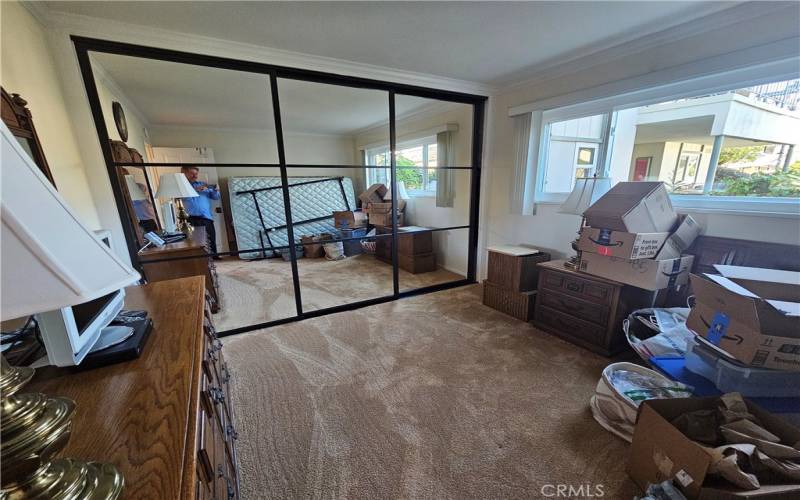 2nd bedroom.  Sliding mirrored closet doors, sorry packing under way.