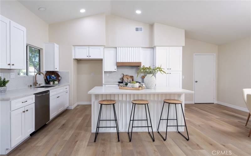 The kitchen is beautifully redone with a large center island.